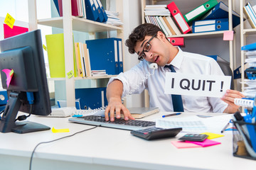 Busy frustrated businessman angry in the office