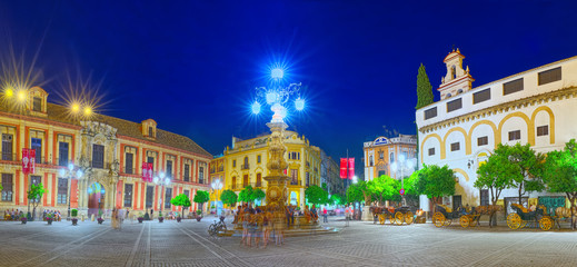 Fototapeta na wymiar Square Virgin of the Kings (Plaza Virgen de los Reyes) and monum