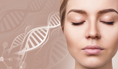 Portrait of sensual woman among white DNA chains.