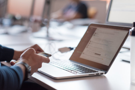businessman working using a laptop in startup office