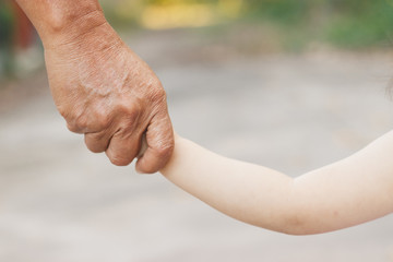 Hands of Fater and baby.