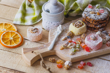 East sweets with fruits, nuts and sugar powder