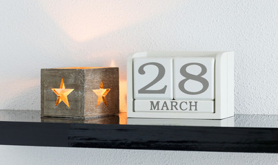 White block calendar present date 28 and month March