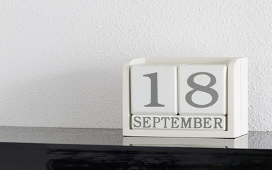 White block calendar present date 18 and month September