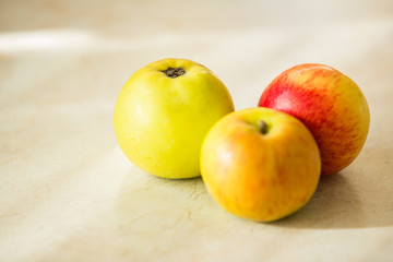 Fresh, ripe organic apples on a table.