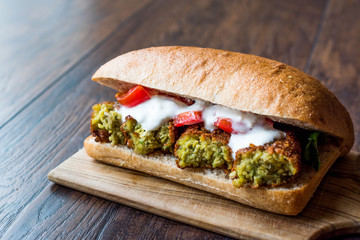 Chickpea Falafel Sandwich with Tomatoes and Sauce