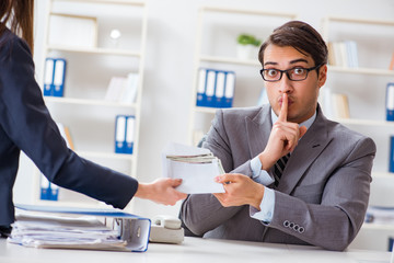 Businessmanbeing offered bribe for breaking law