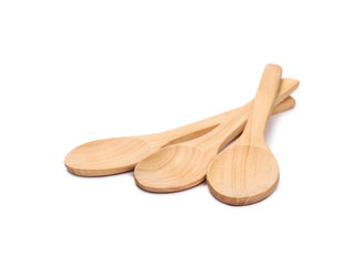Empty wooden spoons isolated on white background