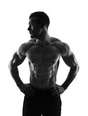 Fototapeta premium Silhouette of a bodybuilder on a white background
