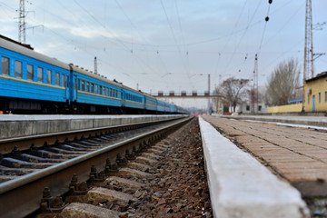 Obraz premium Passenger and freight train. Passenger diesel train traveling speed railway wagons journey light