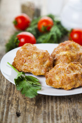 Delicious cutlets, tomatoes and parsley
