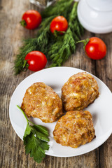Delicious cutlets, tomatoes and parsley