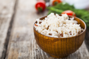 Boiled rice in a wooden bowl