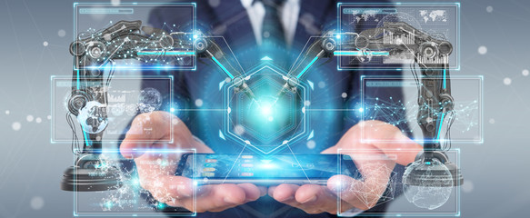 Businessman using robotics arms with digital screen 3D rendering