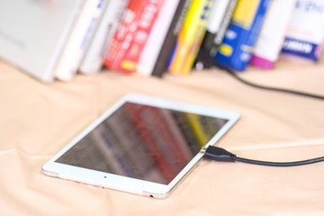 Tablet PC connected with books