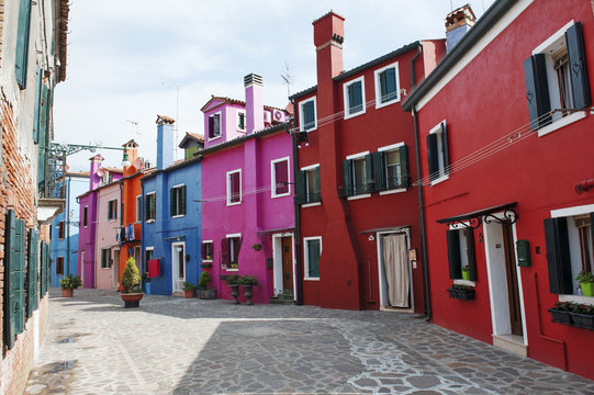 Burano island, Venice, Italy - a street with colorful houses