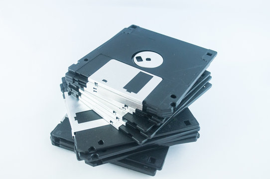 Front of an old magnetic disket on white background
