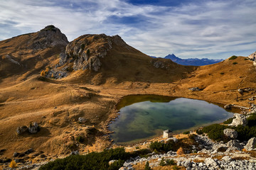 Fototapeta na wymiar Small lake under Passo Valparola, Dolomites, Italy