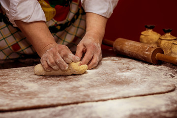 Female hands making dough for pizza. Making bread. Cooking Process Concept 