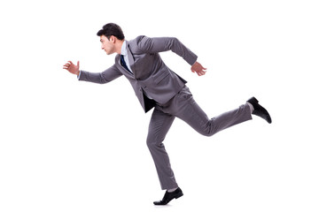 Young businessman running forward isolated on white