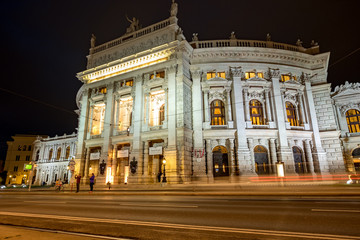 Fototapeta premium Night shot of tram at Burgtheater Vienna