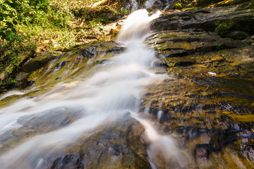Fototapeta na wymiar scenery of tropical forest waterfall