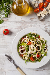 Salad with squid rings.