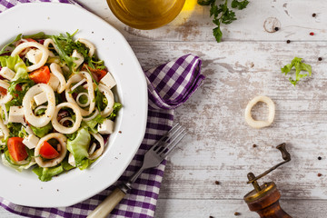 Salad with squid rings.