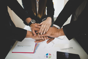 Group Asian Young businessmen join hands for working the job success, Hand coordination,...