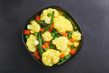 Indian Vegetarian curry Vegetable Korma. Copyspace, top view