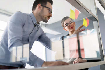 Creative business people working on business project in office