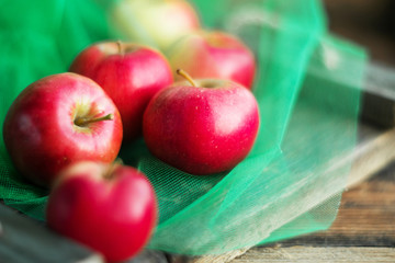 a group of red garden fresh apples on wooden background natural concept for fresh natural food and vitamins