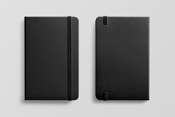 Photorealistic black leather notebook mockup on light grey background, front and rear view. 