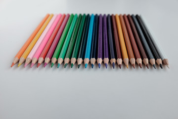 Colour pencils isolated on white background