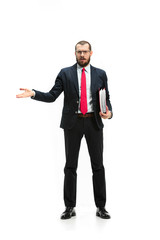 Full body portrait of businessman with folder on white