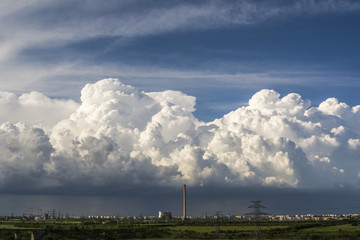 Fototapeta na wymiar Landscape with storm clouds over a city