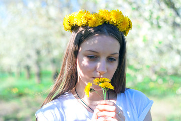 girl in a blooming spring garden