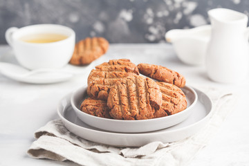 Homemade healthy aquafaba vegan cookies with tea. Vegetarian food concept.