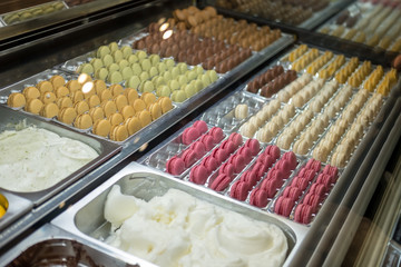 Colorful Macaron and Icecream display in a shop