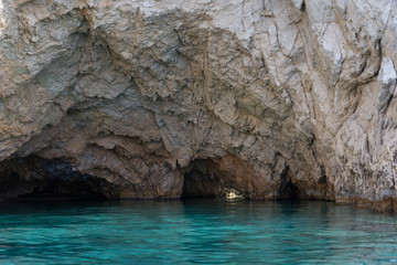 Marathonisi cave and beach on Turtle island (Marathonisi), Greece, south of the island of Zakynthos, Greece.