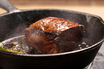 Beef steak on cast iron skillet