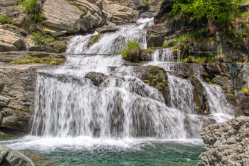 Fototapeta na wymiar Lillaz waterfalls near Cogne, Gran Paradiso national park, Aosta Valley in the Alps, Italy