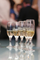 Wedding Accessories. Bridal bouquet and champagne glasses.