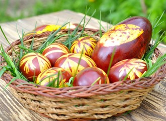 Traditional handmade easter eggs in basket