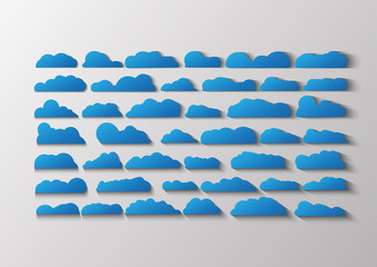 Blue Flat clouds isolated on grey and white  background. Paper cut icon design with shadow.