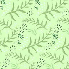 Fototapeta premium Tender spring seamless pattern with green leaves and dots. Cute floral botanical texture with hand drawn doodle leaves for textile, wrapping paper, print design, background, surface
