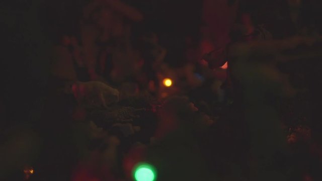 Soft lights illuminating the nativity scene.