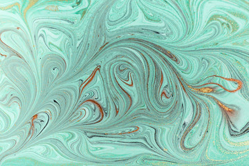 Marble abstract acrylic background. Nature green marbling artwork texture. Golden glitter.