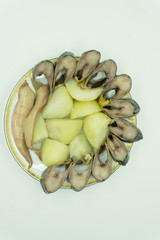 Close up of sea bream fish with potato .