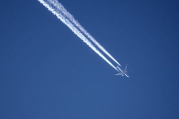 trace of the plane in the sky .